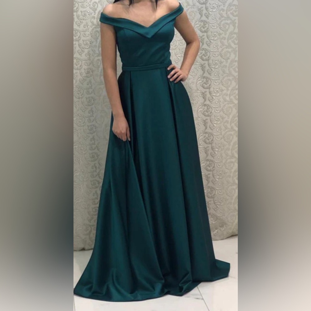 Off the shoulder emerald green satin gown with slit
